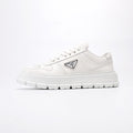 PRADA Triangle Plaque Low-Top Sneakers — hero