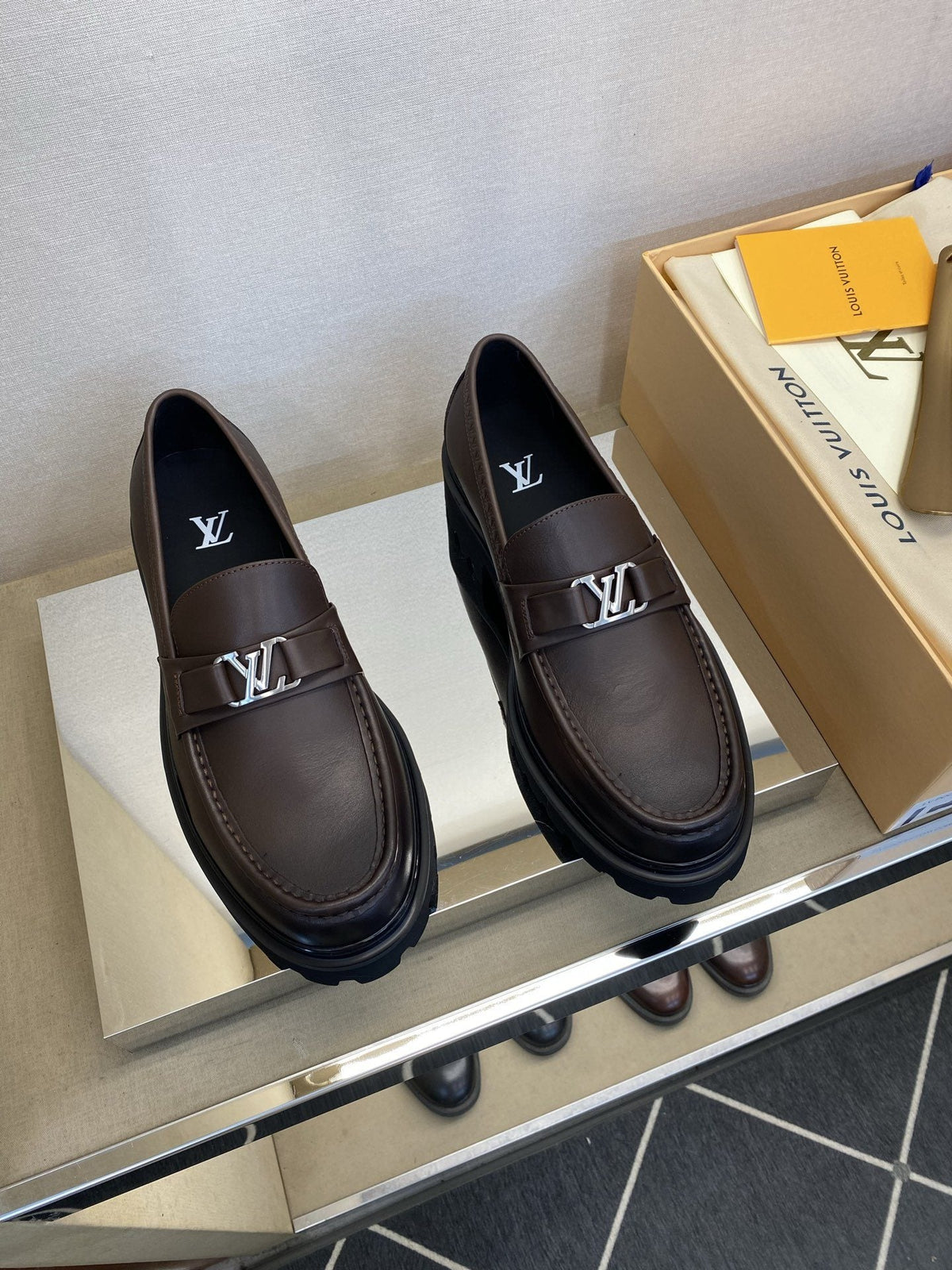 Louis Vuitton Metal Logo Loafers — hero