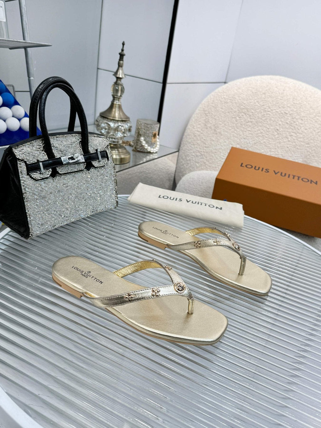 Louis Vuitton Metal-Detail Thong Sandals — front